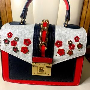 Cute satchel sized purse detailed